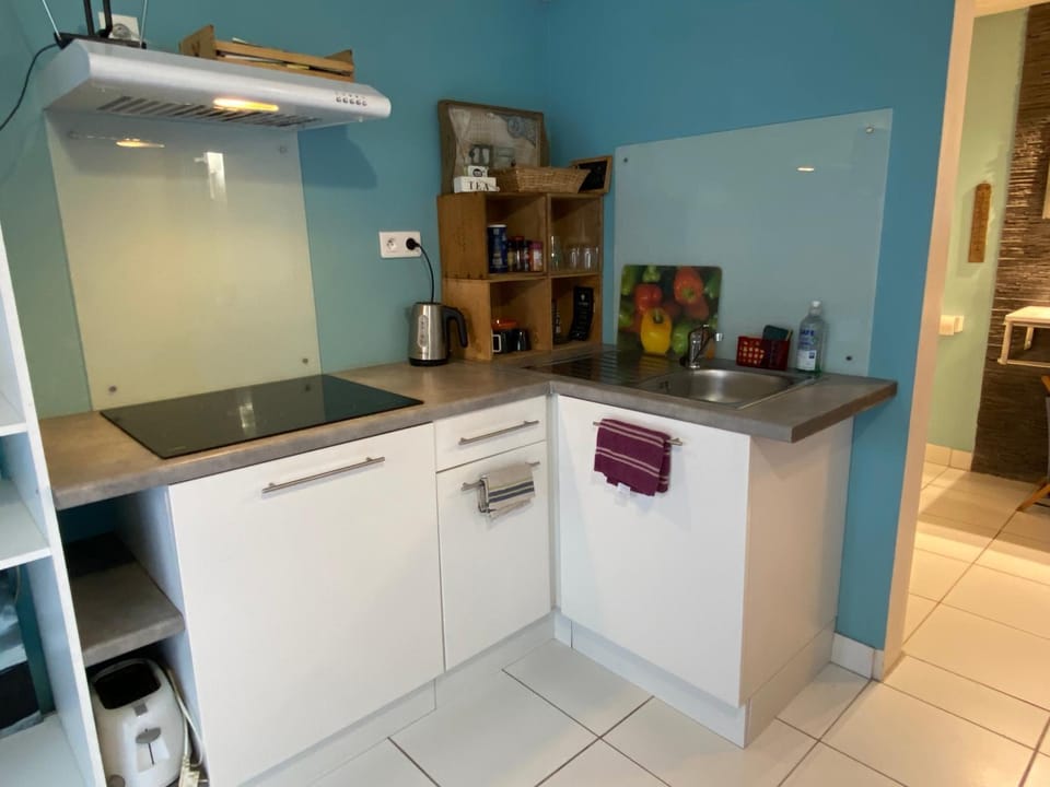 Kitchen or kitchenette, stove