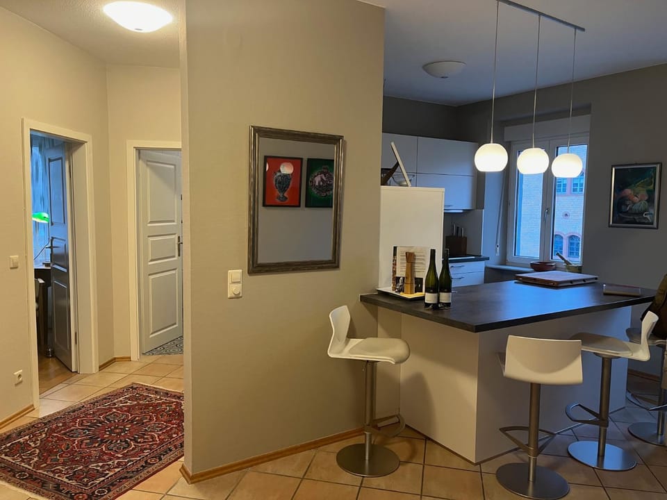 Kitchen or kitchenette, Photo of the whole room, Seating area, stove, kitchen