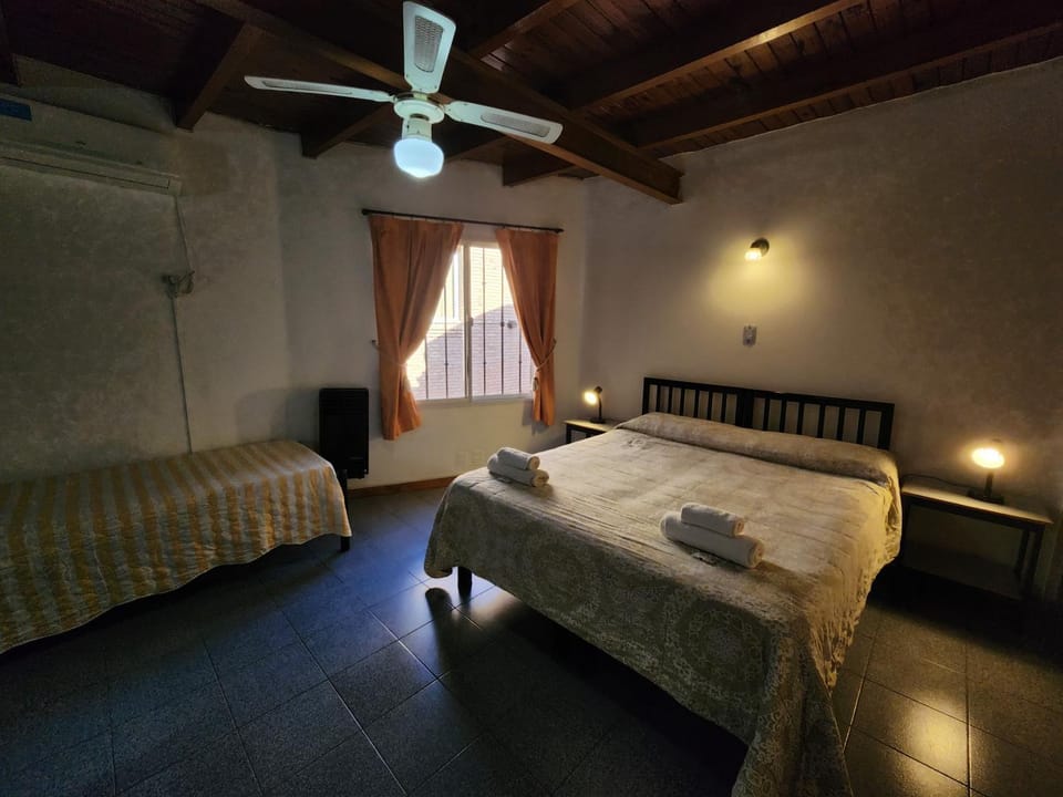 Bed, Photo of the whole room, Bedroom, fireplace, towels, air conditioner