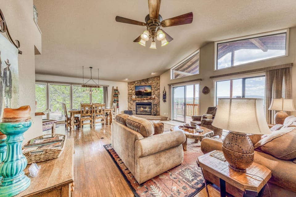 View (from property/room), Living room, Seating area, Dining area, fireplace