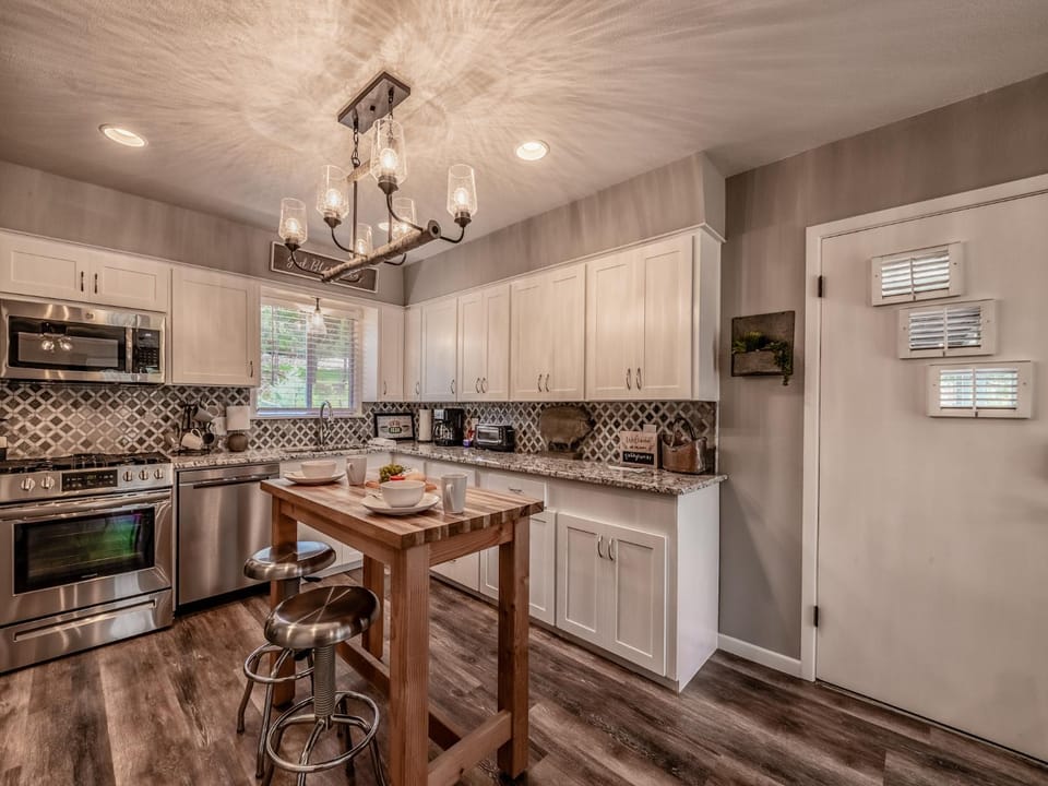 Kitchen or kitchenette, microwave, oven, stove, kitchen