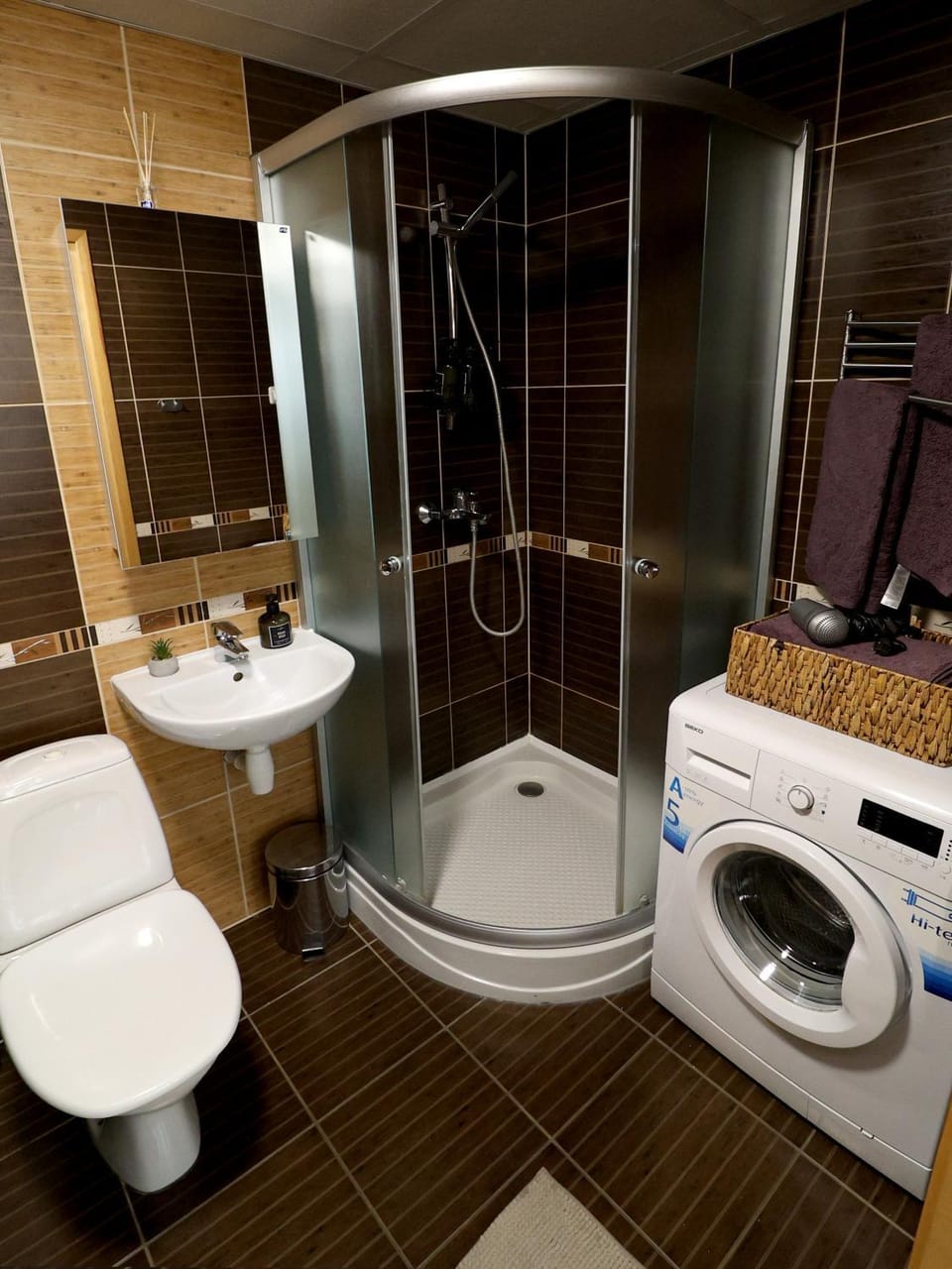 Shower, Toilet, Bathroom, towels, washing machine, dryer
