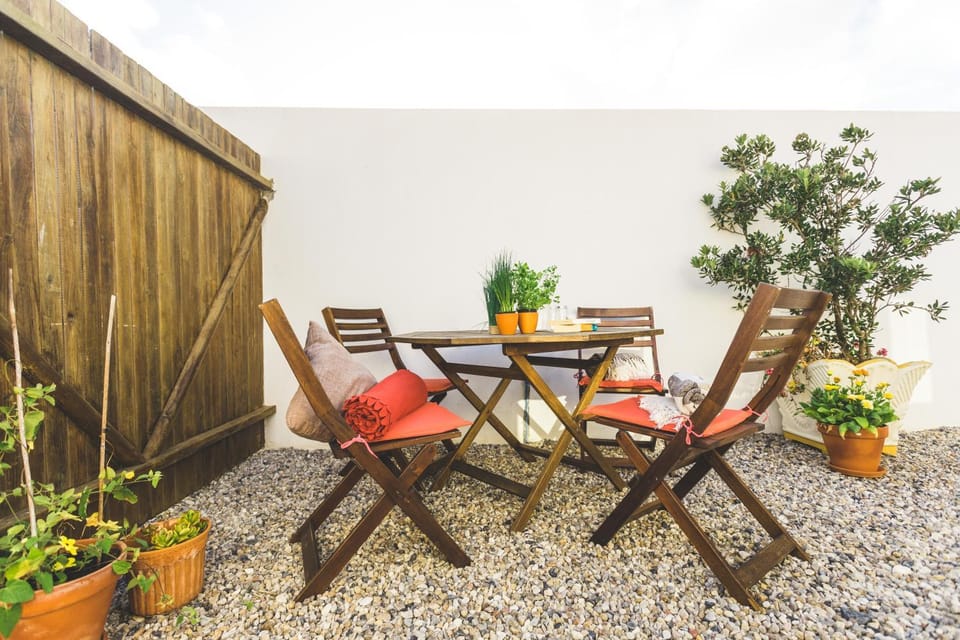 Property building, Patio, Facade/entrance, Bird's eye view, Garden, Decorative detail, Beach, Beach, On site, Garden view, Sea view
