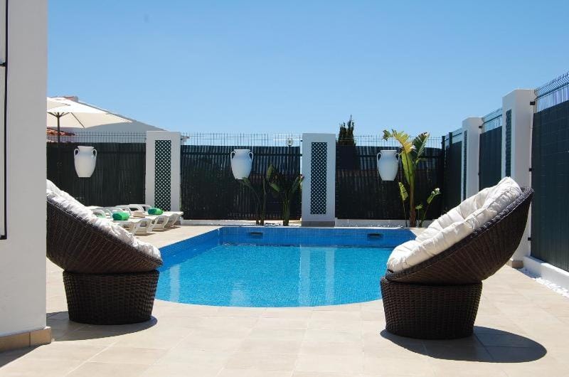 Swimming pool, furniture, sunbed