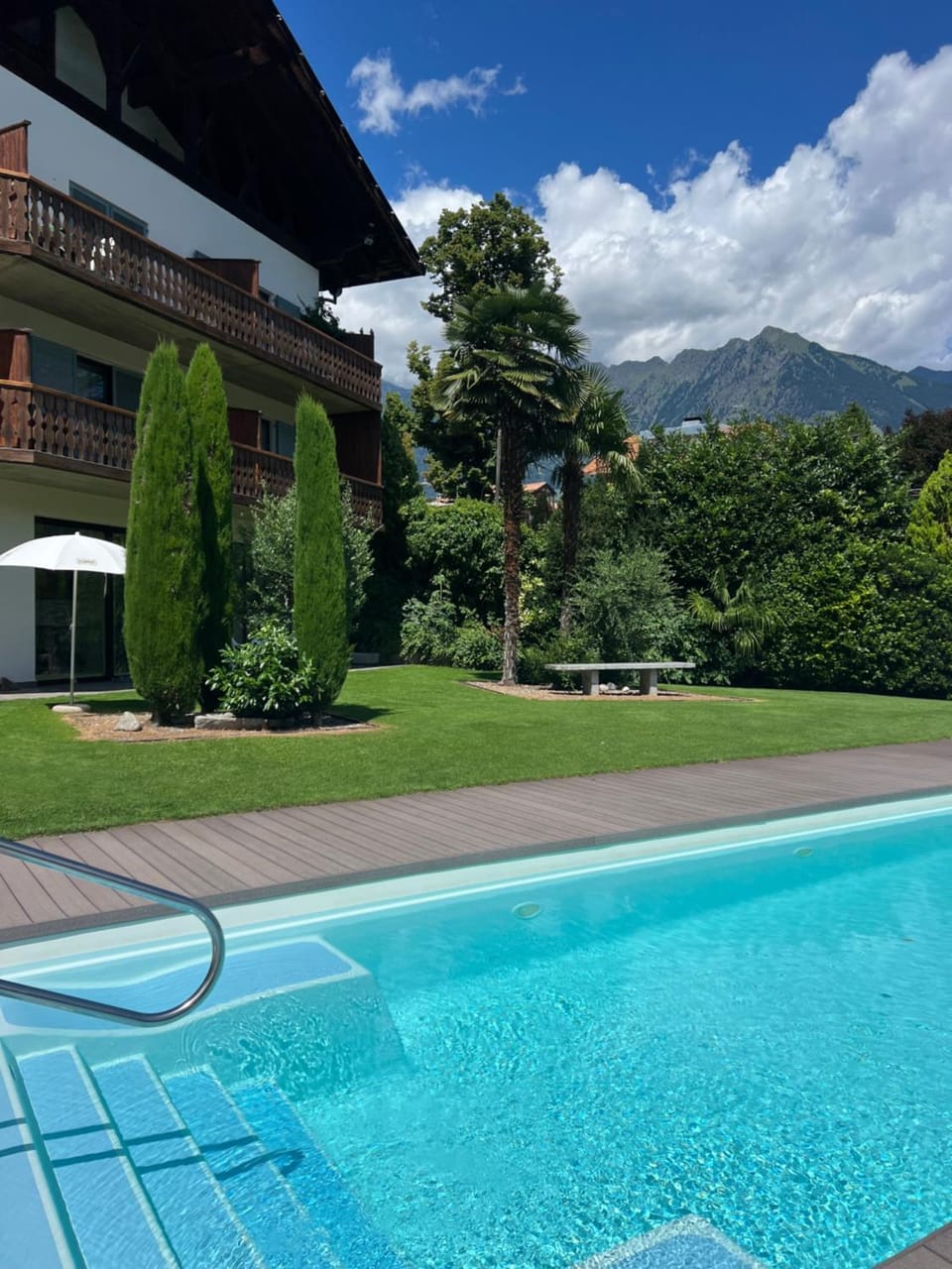 Property building, Natural landscape, Pool view, Swimming pool