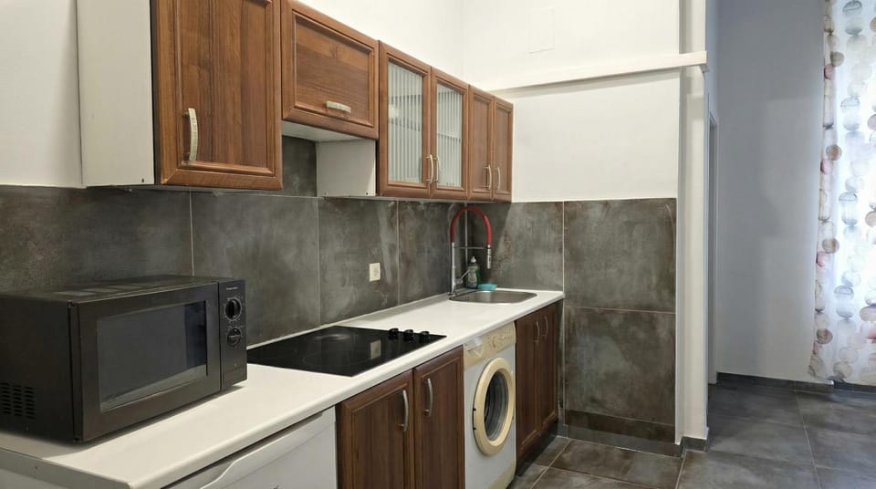 Kitchen or kitchenette, stove