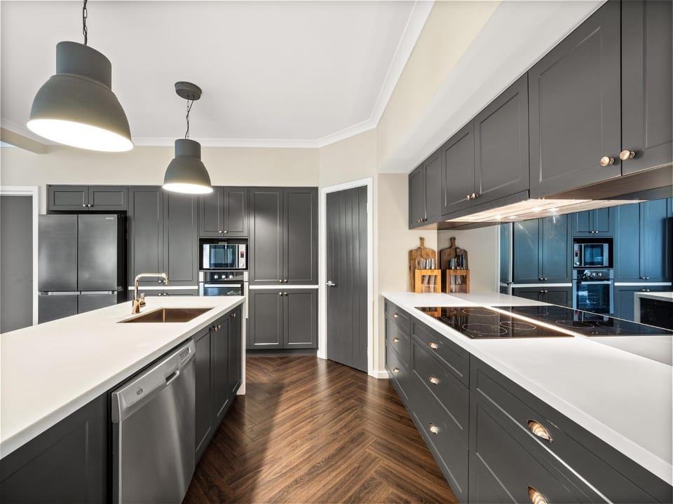 Kitchen or kitchenette, dishwasher, oven, stove, toaster