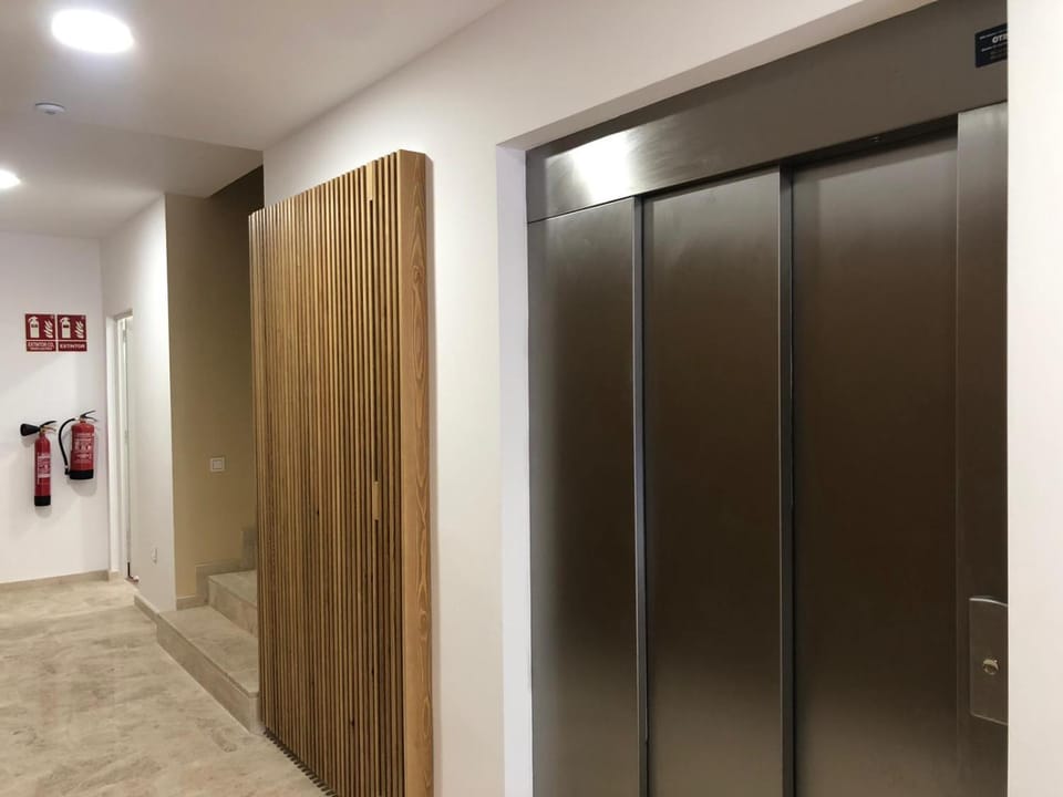 Property building, elevator