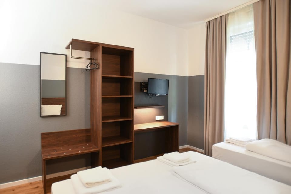 Bed, Photo of the whole room, towels, wardrobe