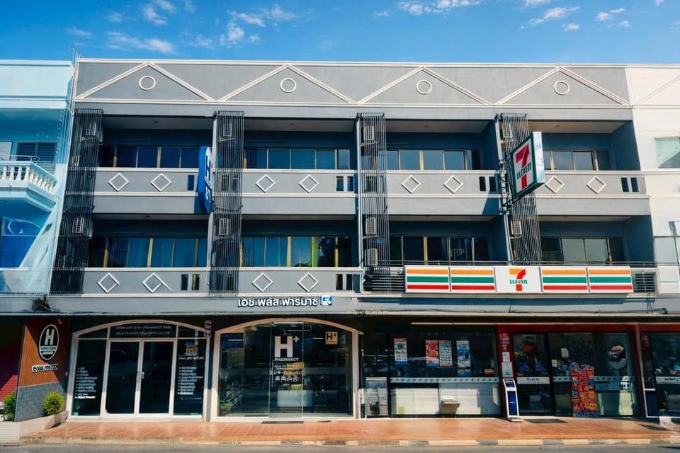 Property building, Facade/entrance, Day, On-site shops, City view, Supermarket/grocery shop, Location