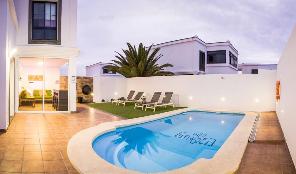 Property building, Patio, Off site, Night, Autumn, On site, Pool view, Swimming pool, Sunset, sunbed