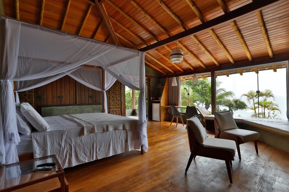 Bed, View (from property/room), Seating area, Bedroom, Sea view
