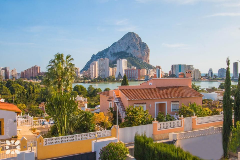 Property building, Nearby landmark, Day, Natural landscape, City view, Mountain view