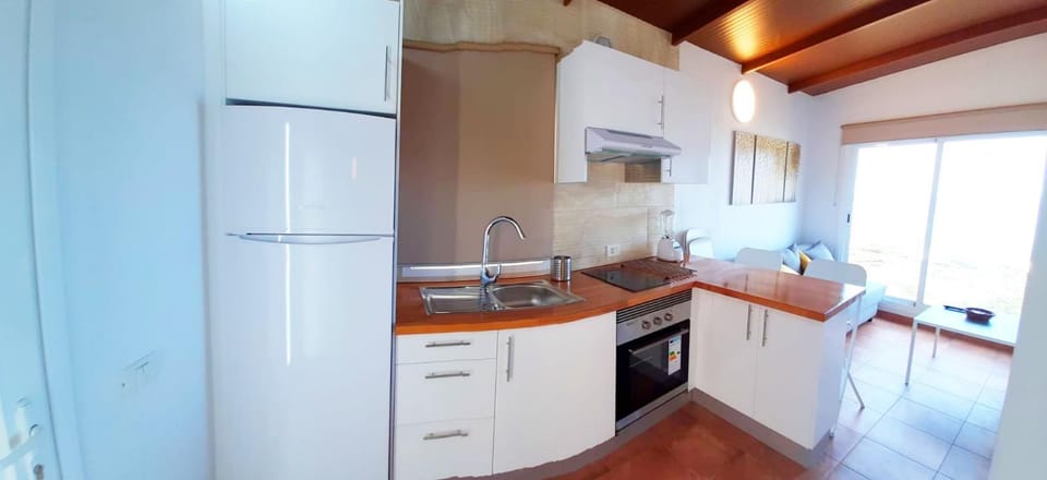 Kitchen or kitchenette, oven