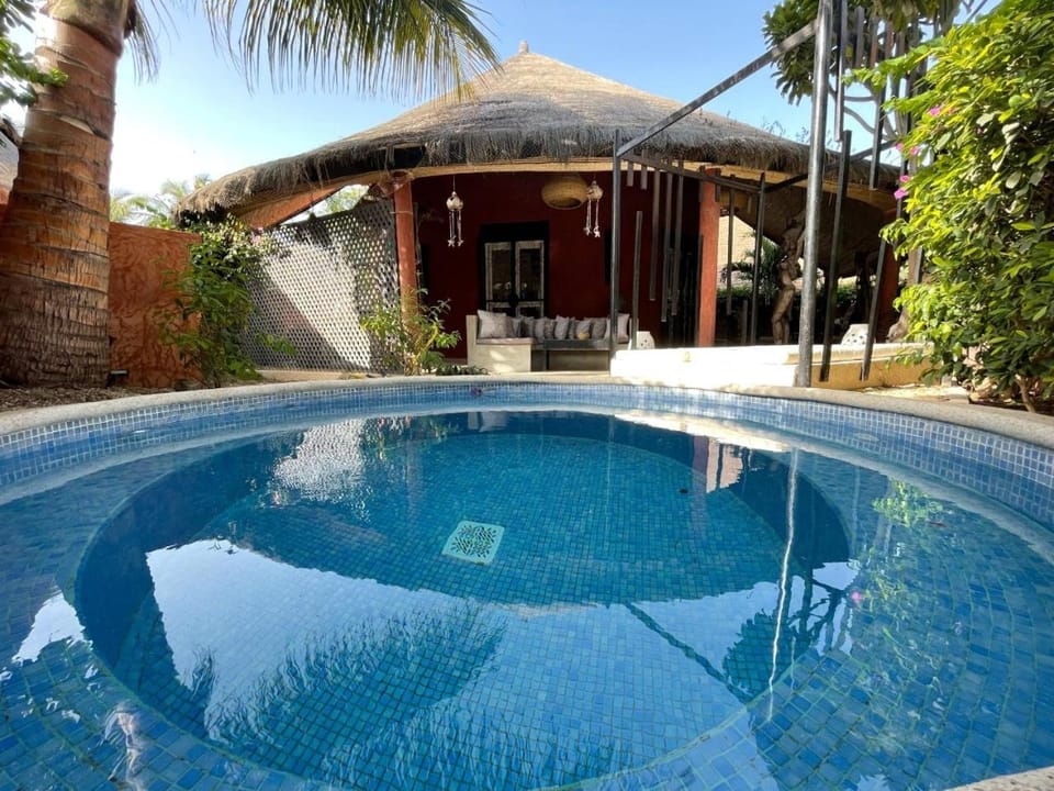 Property building, Pool view, Swimming pool, sunbed