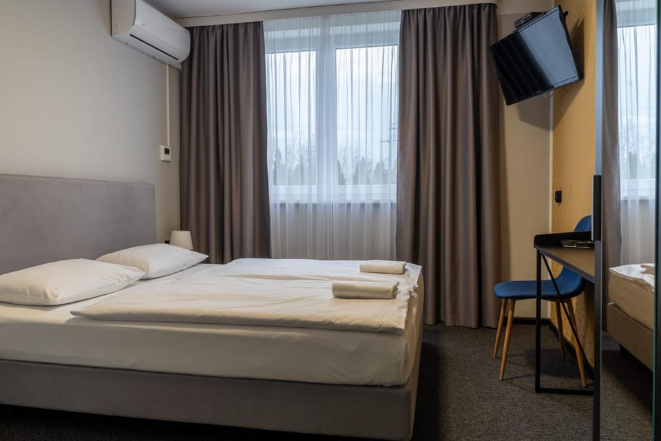 Bed, Photo of the whole room, Bedroom, towels, air conditioner
