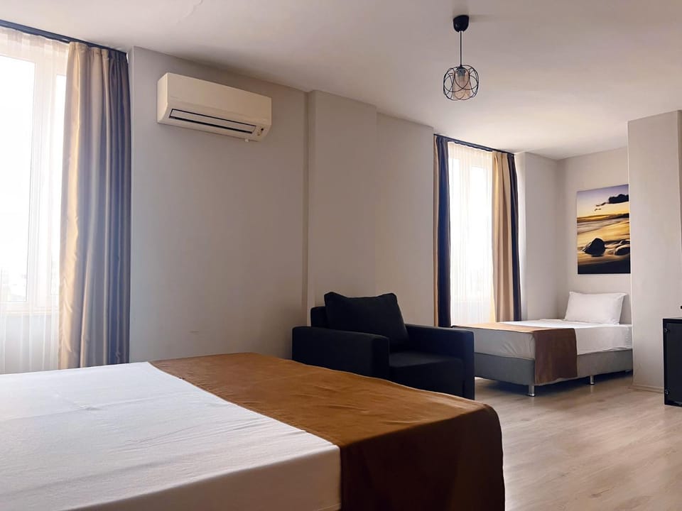 Bed, Photo of the whole room, Seating area, air conditioner