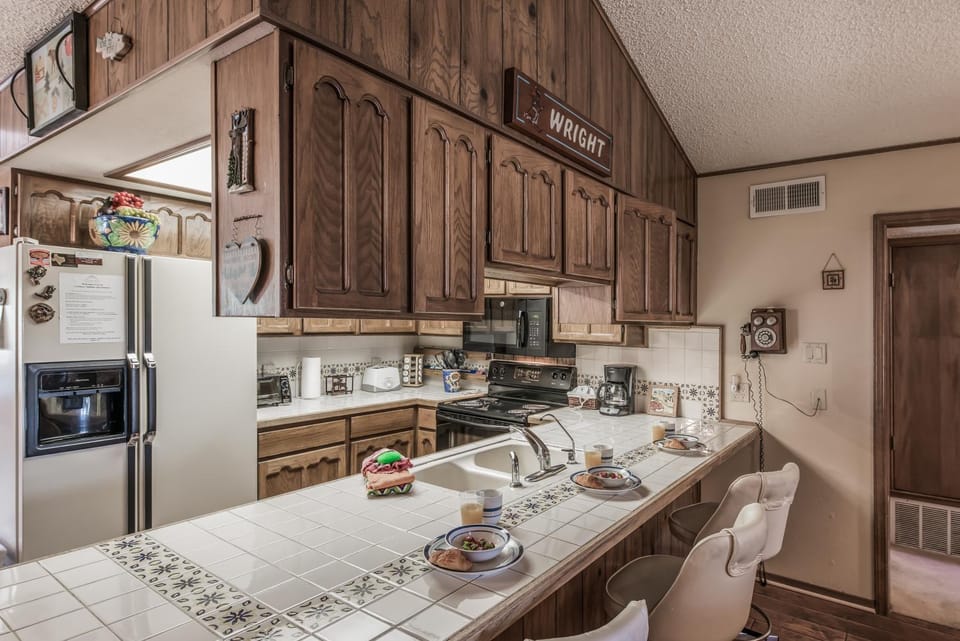 Kitchen or kitchenette, microwave, oven, stove, kitchen