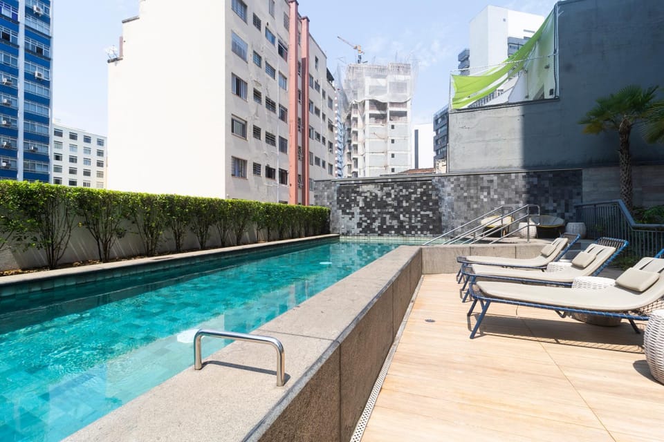 Property building, Day, Pool view, Swimming pool, sunbed