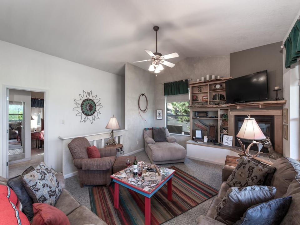 TV and multimedia, Living room, Seating area, fireplace, furniture