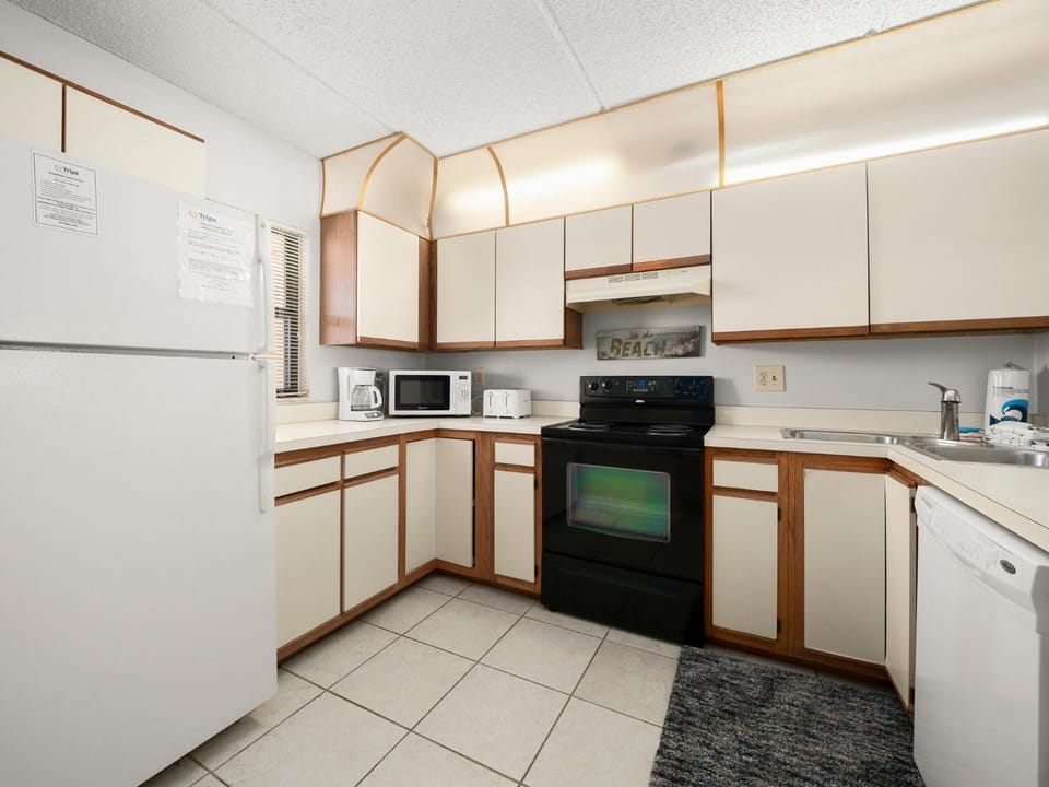 Kitchen or kitchenette, microwave, oven, stove, toaster, kitchen
