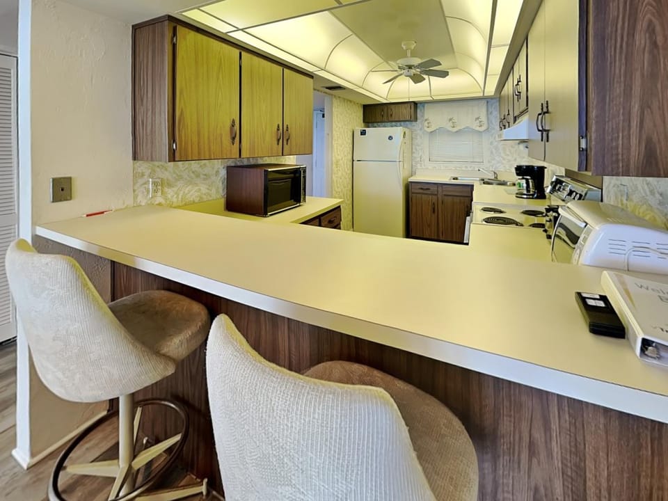 Kitchen or kitchenette, microwave, oven, stove, kitchen