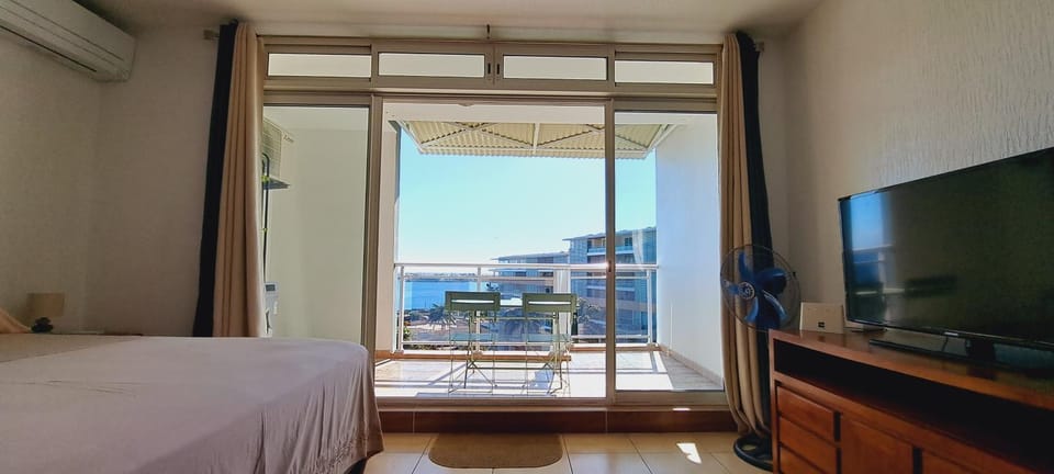 Patio, View (from property/room), View (from property/room), Living room, City view, City view, Sea view, Sea view, air conditioner