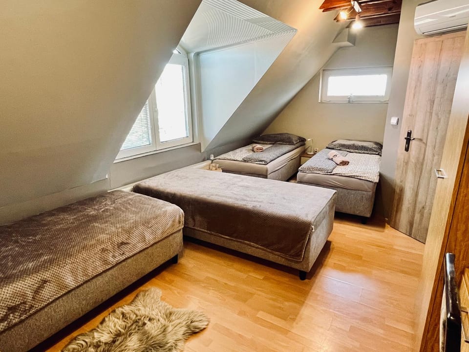 Bed, Photo of the whole room, Bedroom, towels, air conditioner