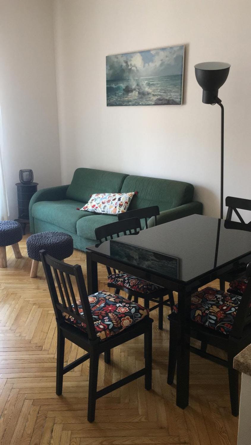 Bed, Living room, Seating area, Dining area