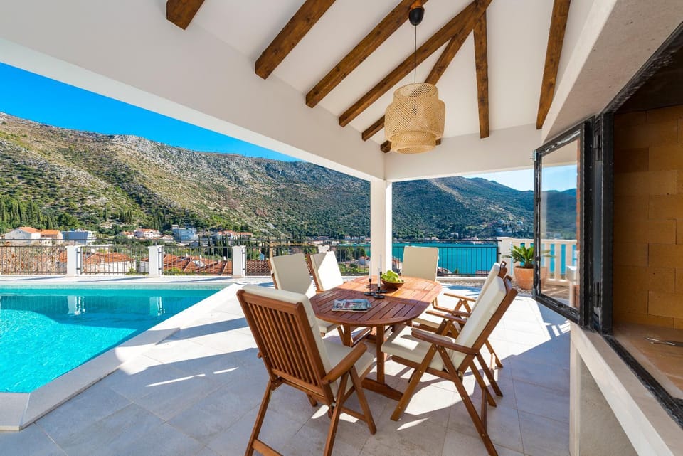 View (from property/room), Balcony/Terrace, Dining area, Mountain view, Pool view, Swimming pool