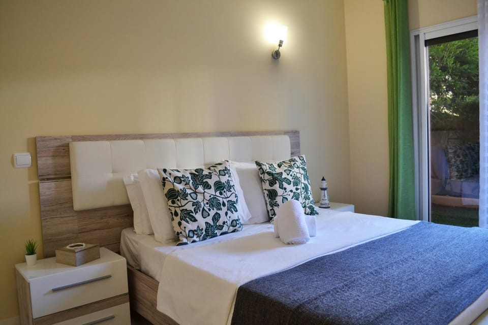 Spring, Bed, Day, Summer, Balcony/Terrace, Photo of the whole room, Decorative detail, Seating area, Bedroom, On site, Text overlay, young children, older children, group of guests, Family, Inner courtyard view
