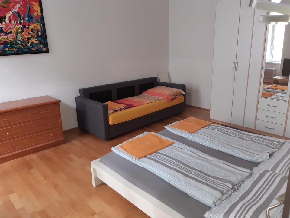 Bed, Living room, Photo of the whole room, Decorative detail, Bedroom, towels, wardrobe