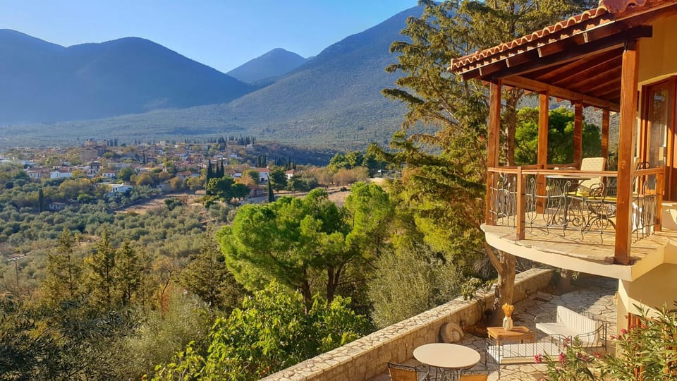 Property building, Patio, Nearby landmark, Spring, Day, Natural landscape, View (from property/room), Balcony/Terrace, Dining area, Mountain view