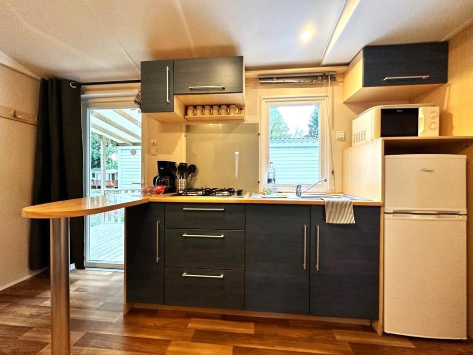 Kitchen or kitchenette, stove
