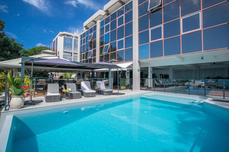 Property building, Patio, Day, Pool view, Swimming pool, Swimming pool, sunbed