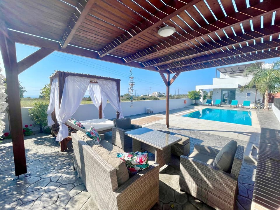 BBQ facilities, Garden, Seating area, Pool view, Sea view, Swimming pool, sunbed