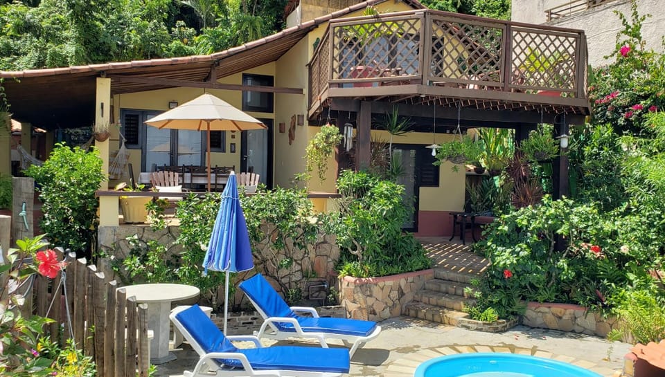Property building, Patio, Garden, Balcony/Terrace, Seating area, Swimming pool