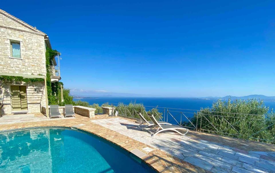 Property building, View (from property/room), Pool view, Sea view, Swimming pool