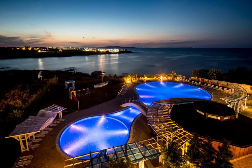 Night, Pool view, Sea view, Swimming pool