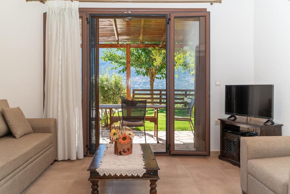 Living room, Seating area, Garden view, Mountain view, Pool view, Sea view