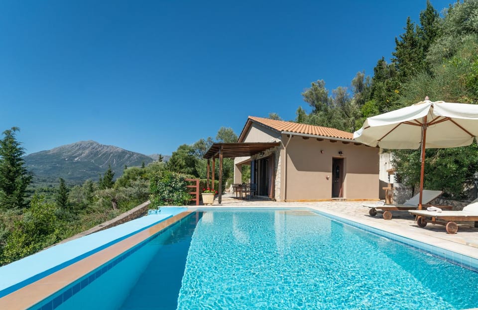 Property building, Patio, BBQ facilities, Pool view, Swimming pool
