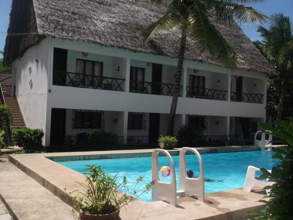 Property building, Facade/entrance, Pool view, Swimming pool