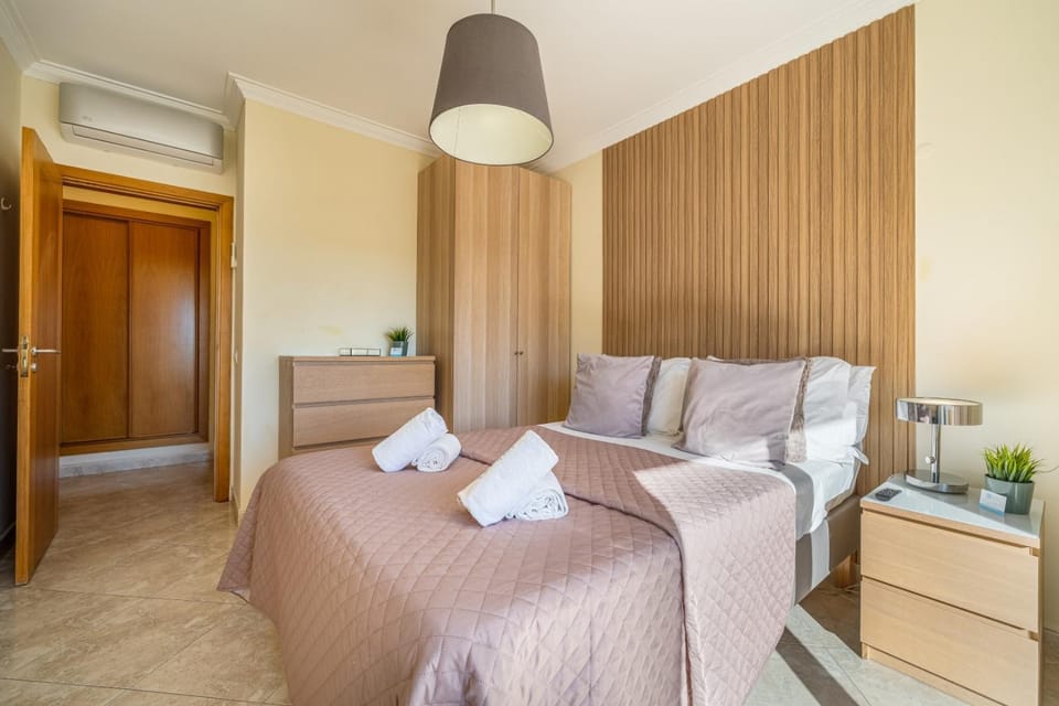 Bed, Living room, Photo of the whole room, Seating area, Bedroom, towels, wardrobe, air conditioner