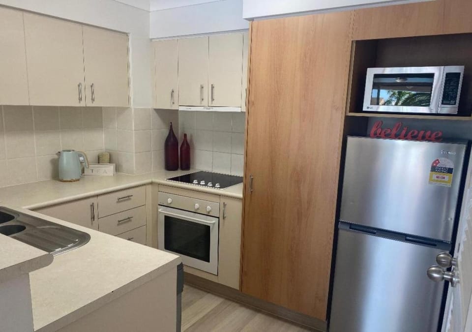 Kitchen or kitchenette, dishwasher, oven, stove, toaster, kitchen