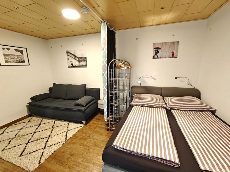 Bed, Seating area, Bedroom