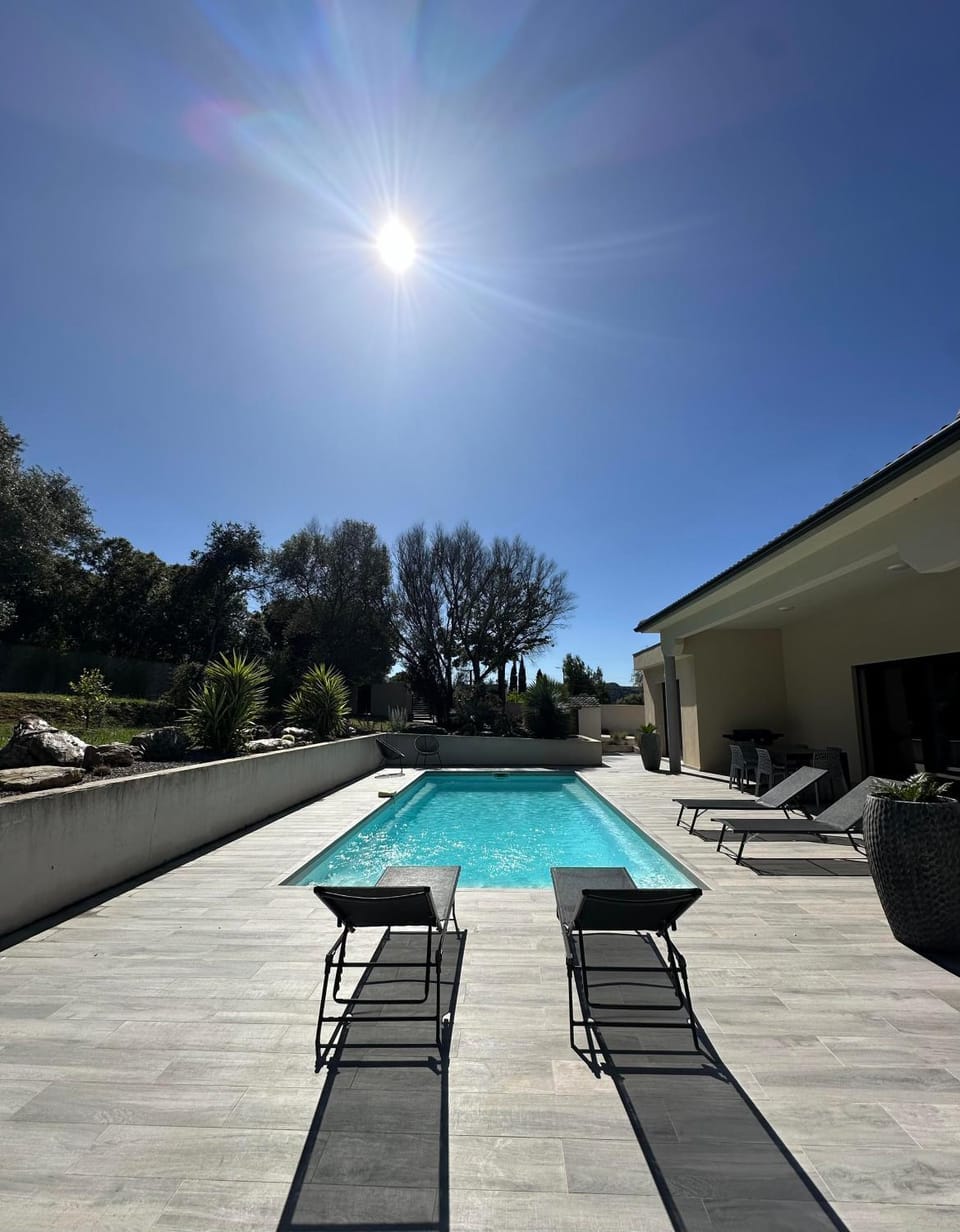 Swimming pool, sunbed