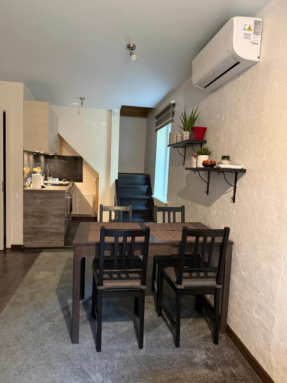 Seating area, kitchen, air conditioner