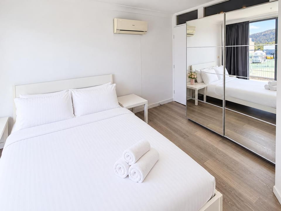 Bed, Bedroom, towels, wardrobe, air conditioner