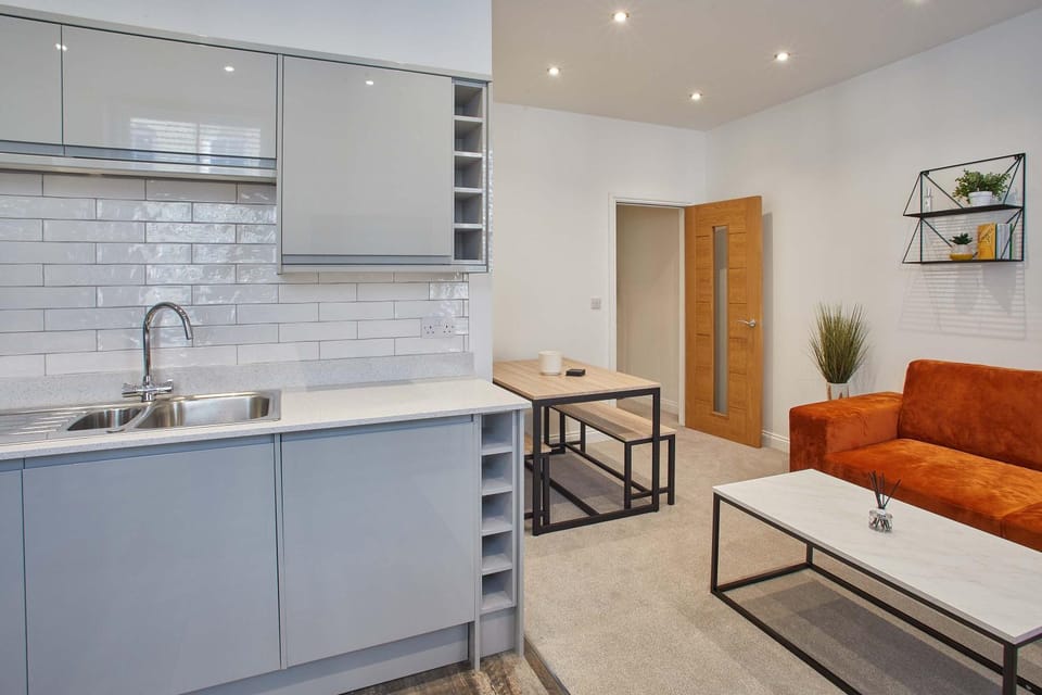 Kitchen or kitchenette, Living room, Seating area, Dining area