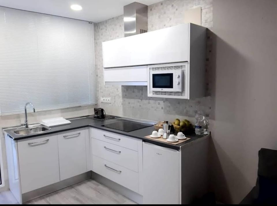 Kitchen or kitchenette, stove